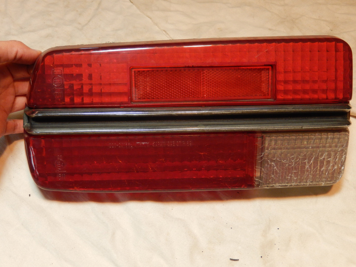 Datsun 240Z Passenger Side Rear Tail Light Lens with Perfect Center Trim