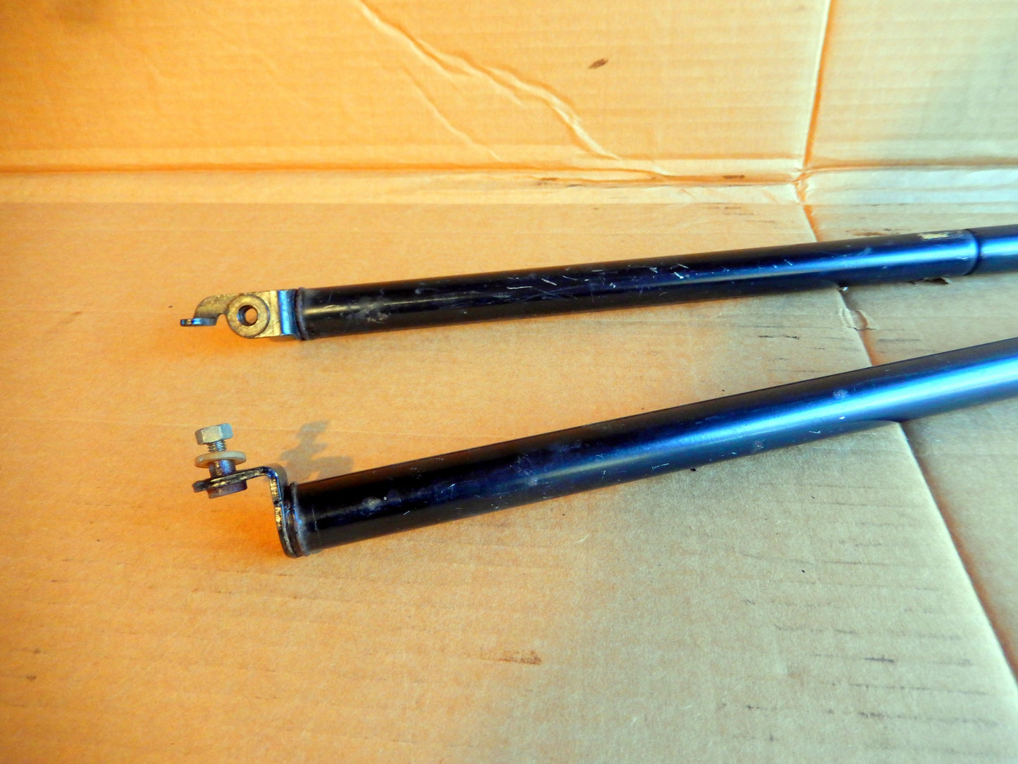 Datsun 280ZX Pair of OEM Hood Lifts