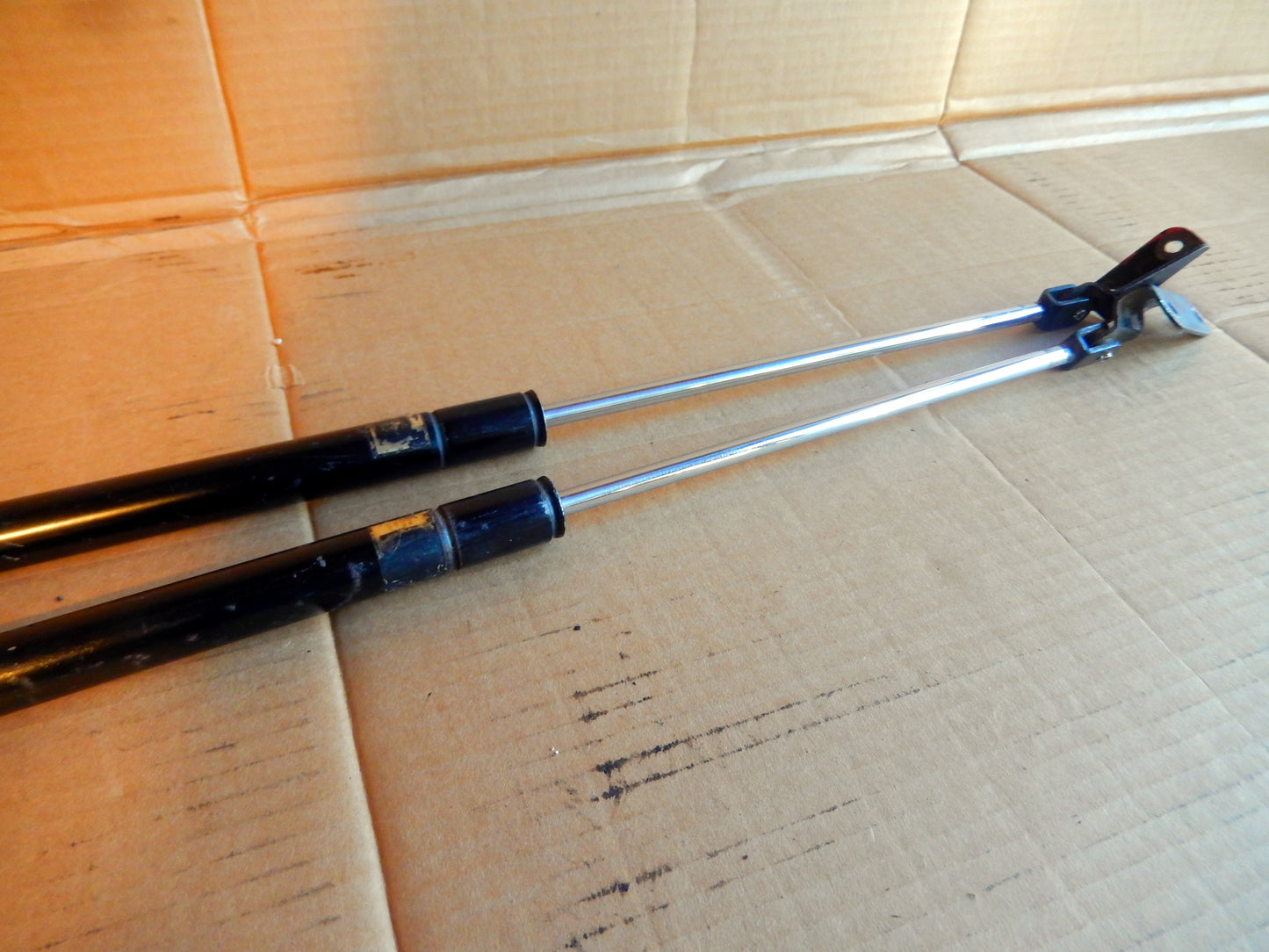 Datsun 280ZX Pair of OEM Hood Lifts