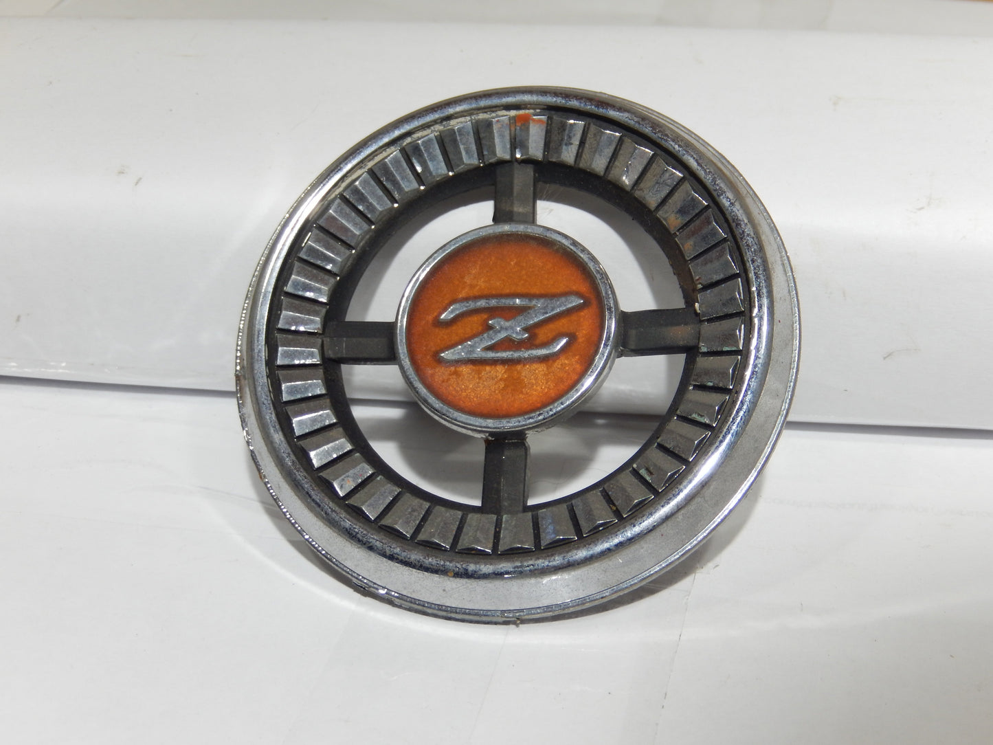 Datsun 280Z 2 + 2 Rear Pillar Vent Badge