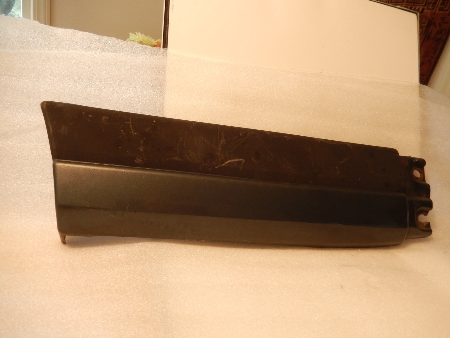 Datsun 280ZX Rear Driver Side Bumper Return Trim