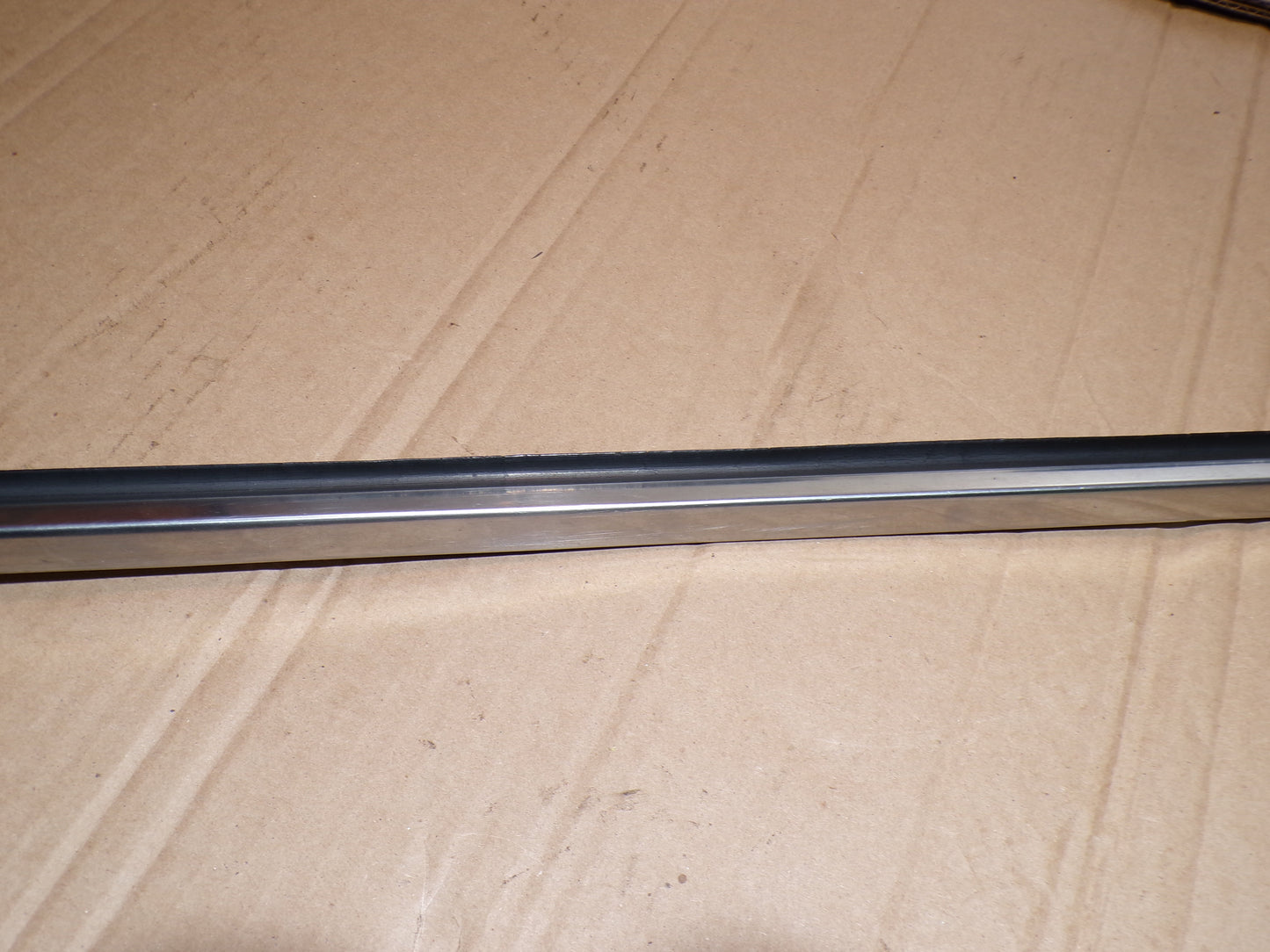 Datsun 240Z Drivers Side Door Window Scraper