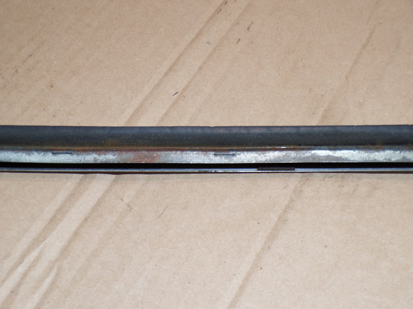 Datsun 240Z Drivers Side Door Window Scraper