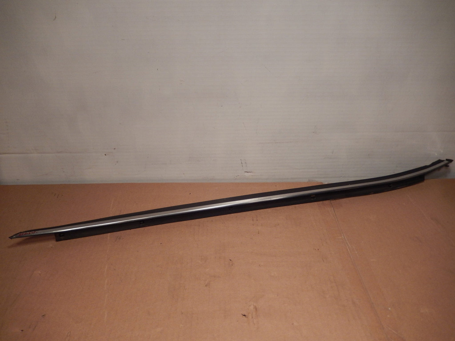 Datsun 280ZX OEM Driver Door Exterior Window Scraper