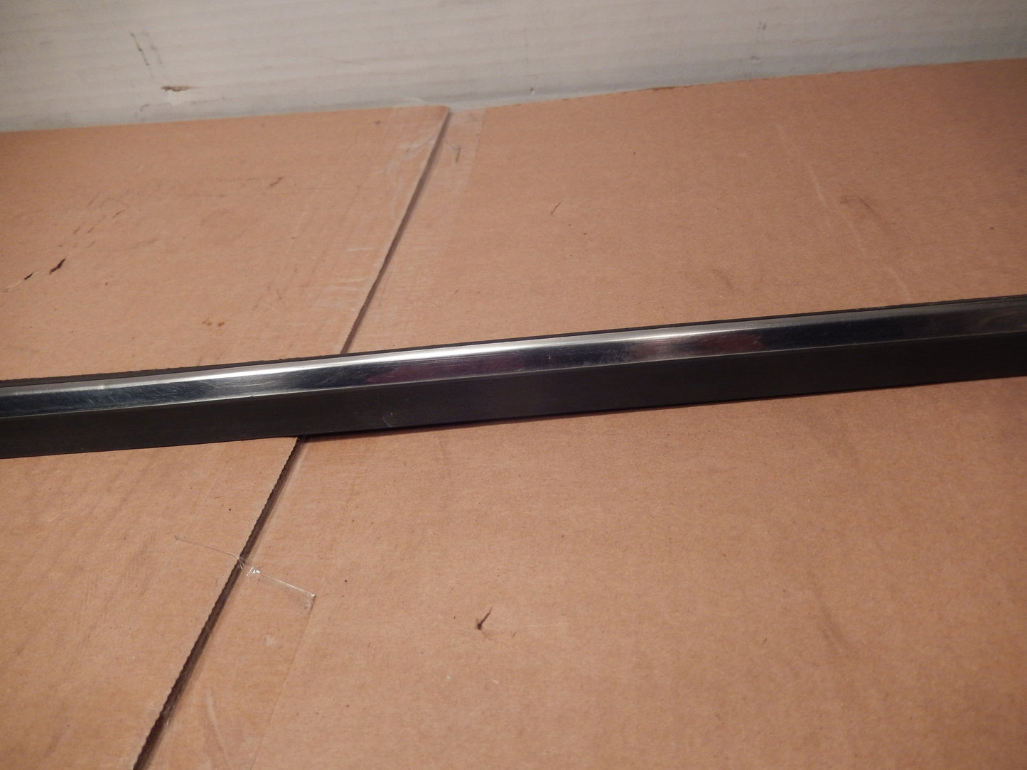 Datsun 280ZX OEM Driver Door Exterior Window Scraper