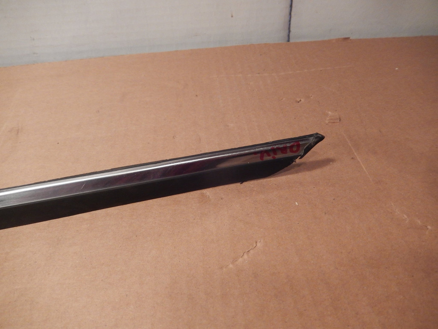 Datsun 280ZX OEM Driver Door Exterior Window Scraper