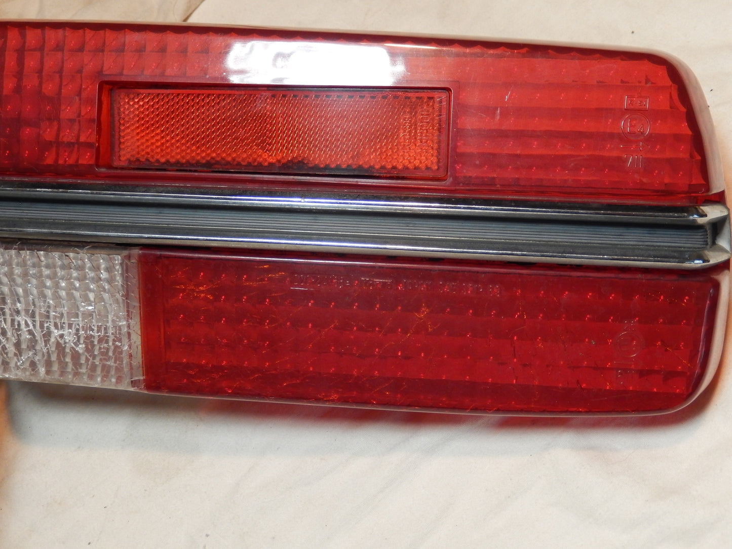 Datsun 240Z Driver's Side Rear Tail Light Lens with Perfect Center Trim