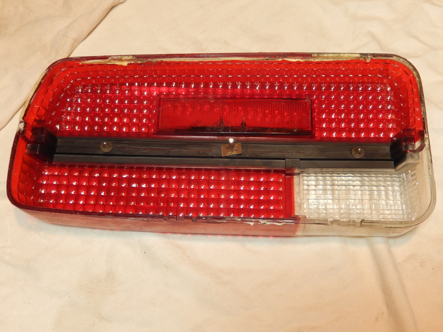 Datsun 240Z Driver's Side Rear Tail Light Lens with Perfect Center Trim
