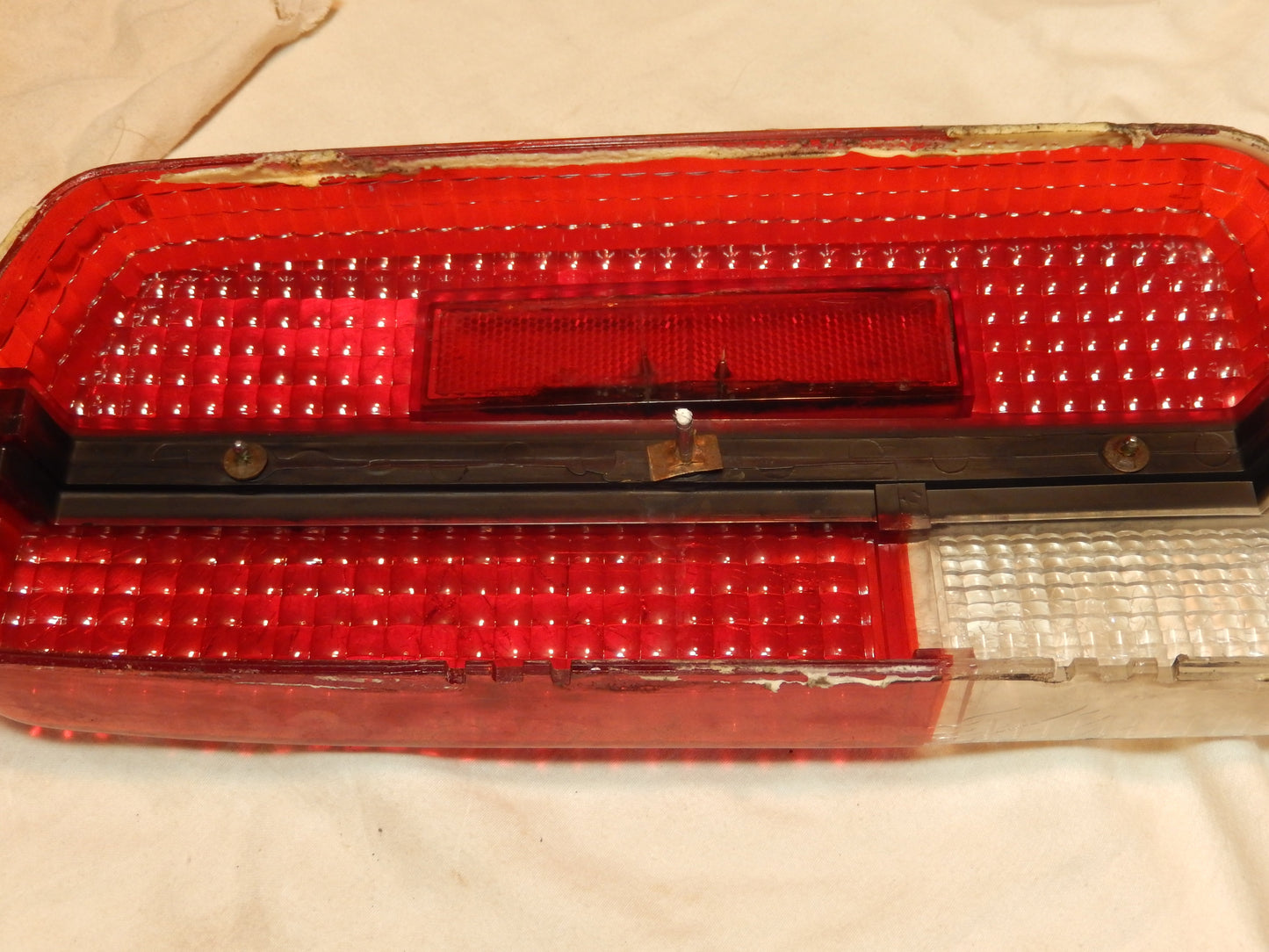 Datsun 240Z Driver's Side Rear Tail Light Lens with Perfect Center Trim