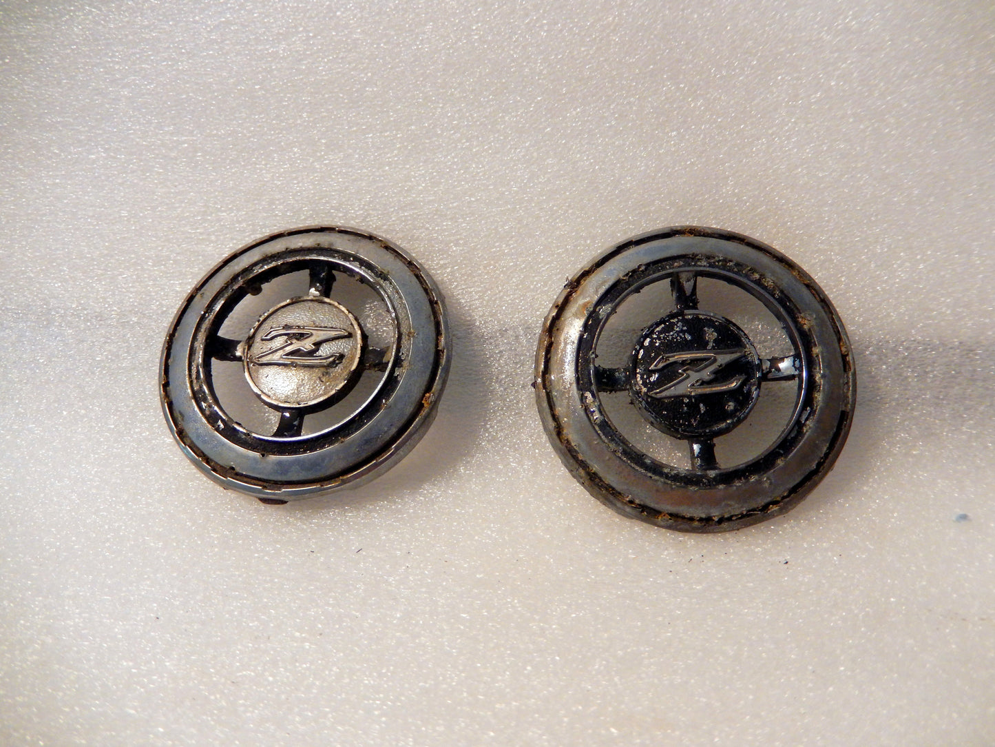 Datsun 240Z Pair of Left and Right Hand Vent Badges