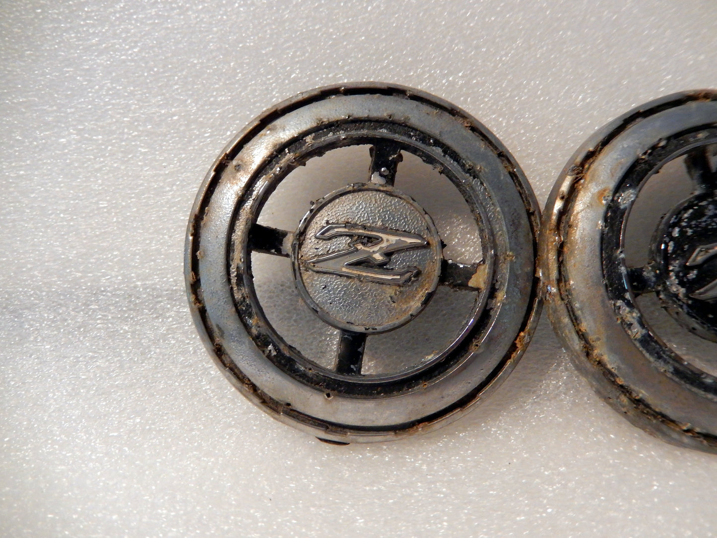 Datsun 240Z Pair of Left and Right Hand Vent Badges