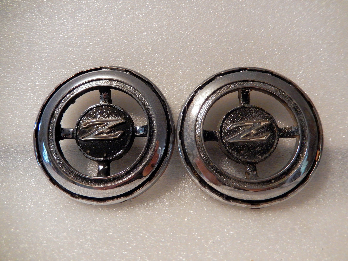 Datsun 240Z Pair of Left and Right Hand Vent Badges