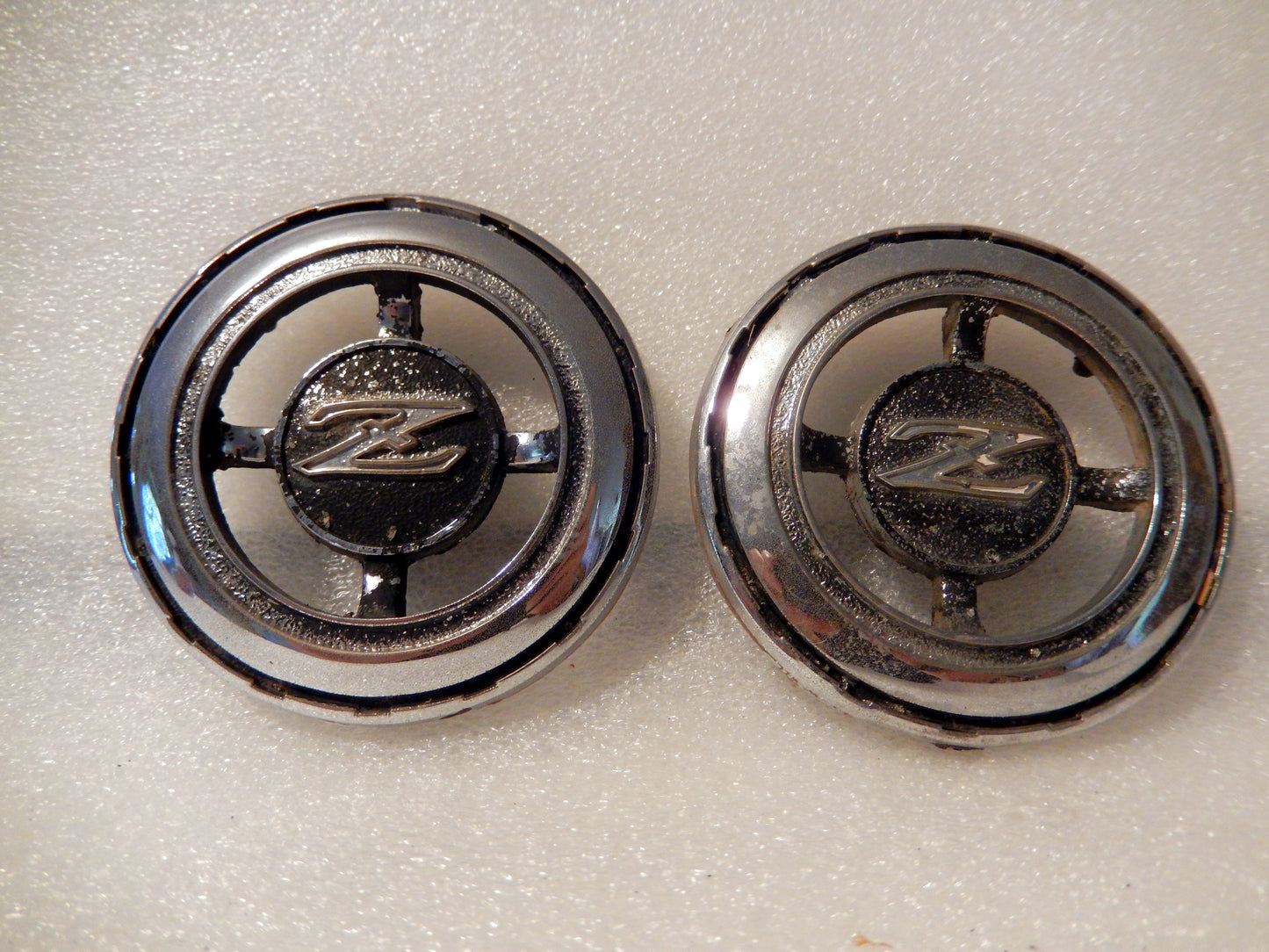Datsun 240Z Pair of Left and Right Hand Vent Badges