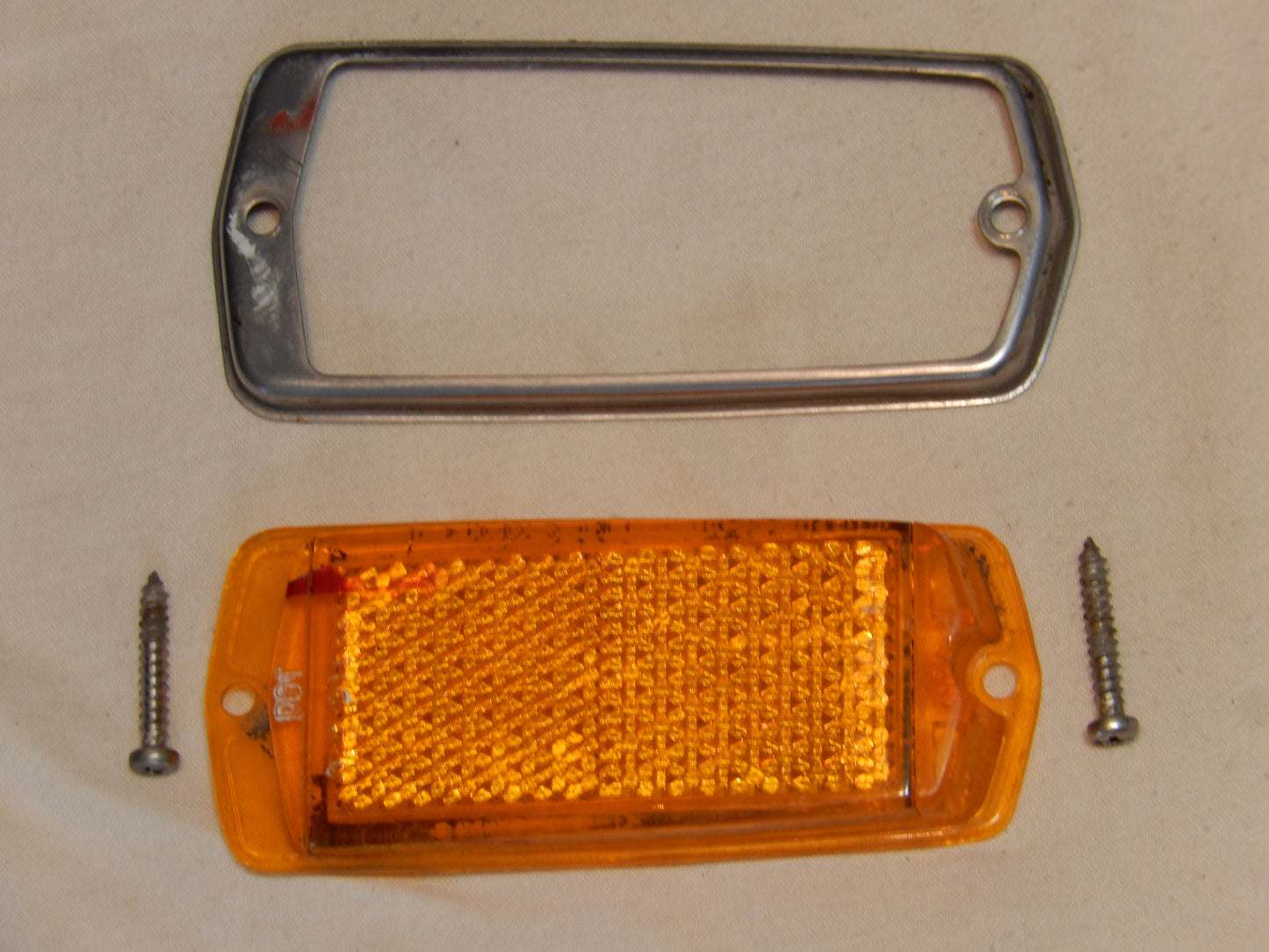 Datsun 240Z Front Side Marker Lens and Trim Surround