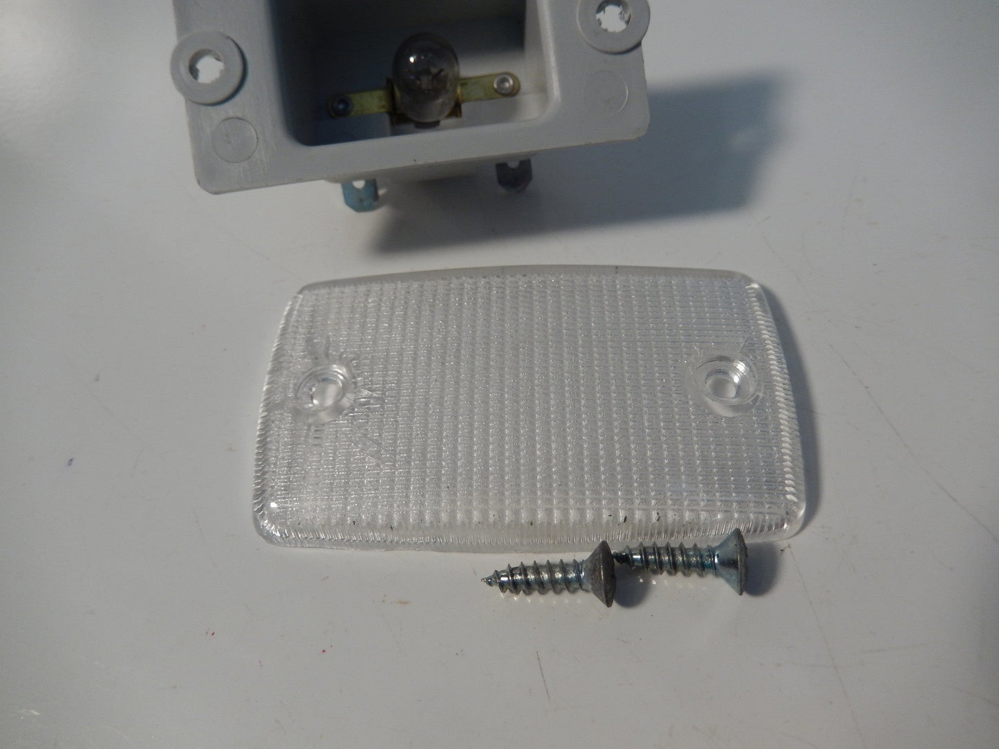 Datsun 280ZX OEM Drivers Side Lower Dashboard Kick Panel Light